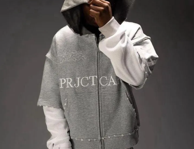 Project Capri Clothing: Discover Styles Beyond Traditional StreetwearStreetwear has changed a lot over the years. What once centered on oversized shirts, sneakers, hoodies, and graphic prints has grown into a broader way of dressing. Today, people mix relaxed pieces with clean basics, tailored items, outdoor-inspired clothing, and classic accessories. This shift gives shoppers more freedom to build outfits that feel personal rather than following one fixed look. Project Capri fits naturally into this wider approach to casual fashion. The idea goes beyond wearing one type of streetwear piece from head to toe. A hoodie can work with tailored pants. A simple t-shirt can sit under a jacket. Relaxed shorts can look polished when paired with the right footwear and accessories. The goal is to create outfits that feel comfortable while still showing thought and personality. For shoppers in the United States, this approach works well because everyday clothing often needs to serve more than one purpose. A good outfit may need to work for a coffee run, a casual office, a weekend event, or an evening with friends. Clothing that can move between these settings gives a wardrobe more flexibility. What Makes Modern Casual Clothing Different? Modern casual dressing is less about strict fashion rules and more about balance. Instead of building an outfit around one loud piece, many people now combine simple items with one or two pieces that add character. Comfort Comes First Comfort has become a major part of everyday style. Soft fabrics, relaxed cuts, roomy hoodies, sweatpants, and easy shirts can form the base of an outfit without making it look unfinished. The trick is choosing pieces with a good fit. Comfortable does not have to mean oversized from head to toe. A loose sweatshirt can look better with straight-leg pants than with another very loose item. Simple Pieces Have More Options A plain t-shirt may seem ordinary, but it can work in many outfits. Wear it with jeans for a casual look, place a jacket over it for cooler weather, or pair it with relaxed trousers for a cleaner appearance. The same idea applies to a Project Capri shirt. Its role in an outfit can change based on the pieces around it. This makes simple clothing useful for people who prefer to buy fewer items and create more combinations. Project Capri Clothing Beyond the Usual Streetwear Formula Traditional streetwear often relies on recognizable combinations. Think of a hoodie, graphic tee, loose pants, and sneakers. There is nothing wrong with that formula, but it is only one way to approach casual clothing. Project Capri clothing can be viewed through a broader lens where relaxed fashion meets everyday versatility. Pair Hoodies With Cleaner Pants A hoodie does not always need to be worn with sweatpants. Try pairing a Project Capri hoodie with straight-leg trousers or clean denim. The contrast creates a relaxed outfit that still looks put together. Keep the colors simple if the hoodie has a bold design. Neutral pants can help the top stand out without making the outfit feel busy. Use Jackets to Change the Mood A jacket can completely alter the appearance of a casual outfit. A simple t-shirt and pants can feel sporty with a lightweight jacket or more refined with a structured outer layer. A Project Capri jacket can become the main piece of an outfit when the rest of the clothing stays understated. This approach also makes layering easier during changing weather. Give Sweatpants a Different Role Sweatpants are no longer limited to lounging at home. The right pair can become part of a casual outfit when worn with a clean shirt, fitted outer layer, and simple sneakers. Project Capri sweatpants can be styled with pieces that create contrast. For example, a relaxed bottom can work well with a more structured jacket. The mix keeps the outfit comfortable without making it look like sleepwear. Building Outfits Around Project Capri Essentials A strong wardrobe does not need dozens of items. A few reliable pieces can create many outfits when they work well together. Project Capri T-Shirt A t-shirt is one of the easiest pieces to style. Choose colors that work with the rest of your closet. White, black, gray, navy, and muted earth tones can be paired with many types of bottoms. For a relaxed weekend outfit, wear a Project Capri t-shirt with jeans and sneakers. For a slightly cleaner look, swap the jeans for straight trousers and add a lightweight jacket. Project Capri Pants Pants can set the tone for the entire outfit. Straight or relaxed cuts are useful because they can work with both fitted and oversized tops. Pair Project Capri pants with a simple t-shirt when you want a low-key outfit. Add a hoodie when the weather gets cooler. A button-up shirt can create a more polished combination without losing the casual feel. Project Capri Shorts Shorts are useful for warm-weather dressing, especially across much of the United States during spring and summer. They can be worn with t-shirts, lightweight sweaters, casual shirts, and sneakers. Project Capri shorts can also work beyond athletic settings. Choose a clean top and understated footwear to give the outfit a more refined appearance. How to Mix Casual and Refined Pieces One of the easiest ways to move beyond traditional streetwear is to mix clothing from different style categories. The result can feel relaxed without looking too casual. Try a Hoodie With a Coat A hoodie under a simple coat creates an interesting contrast. The hoodie brings comfort while the coat adds structure. This combination works well for fall and winter outfits. Keep the colors connected. A neutral hoodie under a dark coat is an easy starting point. Pair Sneakers With Tailored Pants Sneakers can work with more polished pants when the rest of the outfit stays simple. A clean pair of shoes with straight trousers and a plain t-shirt can create a casual look suitable for many everyday situations. This approach shows that footwear does not have to determine the entire style of an outfit. Add a Shirt Over a T-Shirt Layering a casual shirt over a t-shirt is another simple option. Leave the shirt open for a relaxed look or button it up when you want more structure. This combination also gives you an easy way to adjust your outfit during the day. Color Choices That Make Styling Easier Color can make casual dressing much easier. You do not need to wear the same shade from top to bottom, but the colors should feel comfortable together. Start With Neutrals Black, white, gray, beige, navy, and olive are easy to combine. They can form the base of a wardrobe and allow stronger colors to stand out when you want them to. For example, a neutral Project Capri t-shirt can support brighter shorts or a patterned jacket without making the outfit look crowded. Use One Standout Color If you enjoy bold colors, try using one as the focus. A bright hoodie with black pants is easier to style than several bright pieces worn together. The same rule can work with accessories. A colorful cap or bag can add personality without changing the entire outfit. Think About the Season Light colors can feel natural during warmer months, while darker shades often work well in fall and winter. This does not mean you have to follow strict seasonal rules. It simply gives you an easy starting point when planning outfits. Accessories Can Change a Simple Outfit Accessories often have more influence than people expect. A basic outfit can look different with a cap, watch, crossbody bag, sunglasses, or carefully chosen footwear. Keep Accessories Practical Choose accessories that serve a purpose. A crossbody bag can carry daily items while adding shape to an outfit. A cap can provide sun protection and complete a casual look. The goal is not to add as many accessories as possible. One or two well-chosen pieces can be enough. Pay Attention to Footwear Shoes have a strong effect on the final appearance of an outfit. Sneakers are an easy choice for casual clothing, but boots, loafers, and other simple shoes can change the mood. Think about the setting before choosing. A relaxed sneaker may suit a weekend outing, while a cleaner shoe may work better for a dinner or casual workplace. Dressing for Different Everyday Settings Clothing becomes more useful when it works across different parts of daily life. Instead of creating separate wardrobes for every occasion, look for pieces that can be adjusted with small changes. Weekend Outfit A Project Capri t-shirt, relaxed pants, and sneakers can create an easy weekend combination. Add a cap or lightweight jacket if you want more detail. Casual Work Setting If your workplace allows casual clothing, try straight pants with a clean shirt and simple jacket. Keep graphics and accessories understated. Evening Plans For an evening look, start with a plain t-shirt or shirt and add a structured jacket. Darker pants and cleaner footwear can make the outfit feel more polished without becoming formal. Warm-Weather Days Project Capri apparel can work well for summer styling when paired with lightweight pieces. Shorts, t-shirts, breathable shirts, and simple sneakers can create an outfit that feels easy and practical. Creating a Personal Style With Fewer Rules Personal style does not need to follow a specific category. You can enjoy streetwear one day and wear a cleaner casual outfit the next. What matters is finding combinations that fit your lifestyle and feel natural to wear. Project Capri streetwear can be one part of that wardrobe rather than the whole identity of your style. A hoodie may be useful one day, while a simple jacket and trousers may make more sense the next. Start by identifying the pieces you wear most often. Look at their colors, shapes, and fabrics. Then add items that work with what you already own. This method can help reduce unnecessary purchases and make getting dressed easier. It also gives you room to experiment. Try changing one part of an outfit at a time. Swap sneakers for boots. Replace sweatpants with straight-leg pants. Add a jacket over a t-shirt. Small changes can create completely different results. Why Versatility Matters in a Modern Wardrobe A versatile wardrobe gives you more choices without requiring more clothing. When one shirt works with several pairs of pants and a jacket can be worn over different tops, each item becomes more useful. This is especially helpful for people who prefer practical shopping. Instead of buying something because it looks good in one outfit, think about how many ways you could wear it. Project Capri clothing can fit this approach when pieces are treated as building blocks. A Project Capri hoodie does not have to stay within one streetwear outfit. Project Capri pants do not need to be matched with a specific type of top. The more combinations you see, the more freedom you have. Final Thoughts Modern casual fashion gives people more freedom than traditional style categories once allowed. Streetwear can be mixed with cleaner pieces, classic clothing, seasonal layers, and practical accessories. The result can feel relaxed while still reflecting personal taste. Project Capri offers a useful starting point for this kind of dressing. Shirts, hoodies, pants, shorts, jackets, and other casual pieces can take on different roles depending on how they are styled. Instead of following one fixed formula, focus on fit, color, comfort, layering, and the setting. The best wardrobe is one that works for real life. When your clothes can move from a relaxed afternoon to evening plans with only a few changes, getting dressed becomes simpler. That freedom is what makes modern casual style worth trying. Frequently Asked Questions 1. What is Project Capri clothing? Project Capri clothing refers to casual fashion pieces that can be styled in relaxed, contemporary outfits. The range can include items such as t-shirts, hoodies, pants, shorts, sweatpants, and jackets. 2. Can streetwear be worn in a more polished way? Yes. Pair relaxed pieces with straight pants, structured jackets, clean footwear, and simple accessories. Mixing casual and refined items can create a balanced outfit. 3. How can I style a Project Capri hoodie? A hoodie can be worn with jeans, straight pants, or relaxed trousers. Add simple sneakers for a casual look or a structured jacket when you want more shape. 4. Are Project Capri shorts suitable for everyday outfits? Yes. Shorts can be paired with t-shirts, casual shirts, lightweight layers, and sneakers for warm-weather outfits. Color and fit can help determine how casual or polished the final look feels. 5. How can I build a wardrobe with fewer clothes? Start with versatile basics that work together. Choose a few reliable tops, bottoms, layers, and shoes in colors that are easy to combine. Then create different outfits by changing layers, footwear, and accessories.